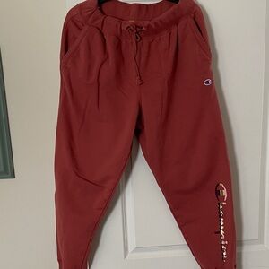 Champion Women’s deep coral color.  Jogger Sweatpants.